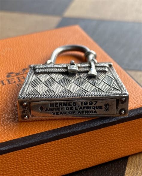 pendentif argent hermes